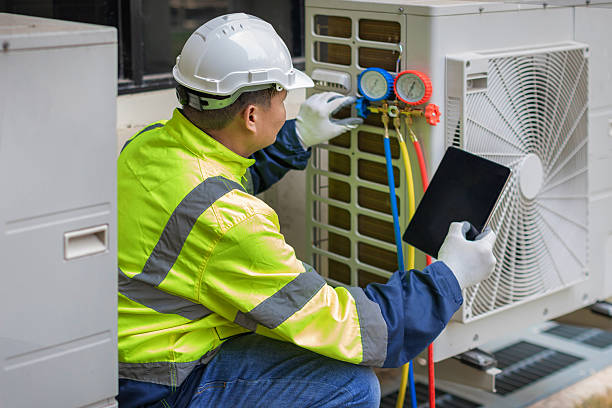 Professional Hvac technician working in Blue Grass, IA